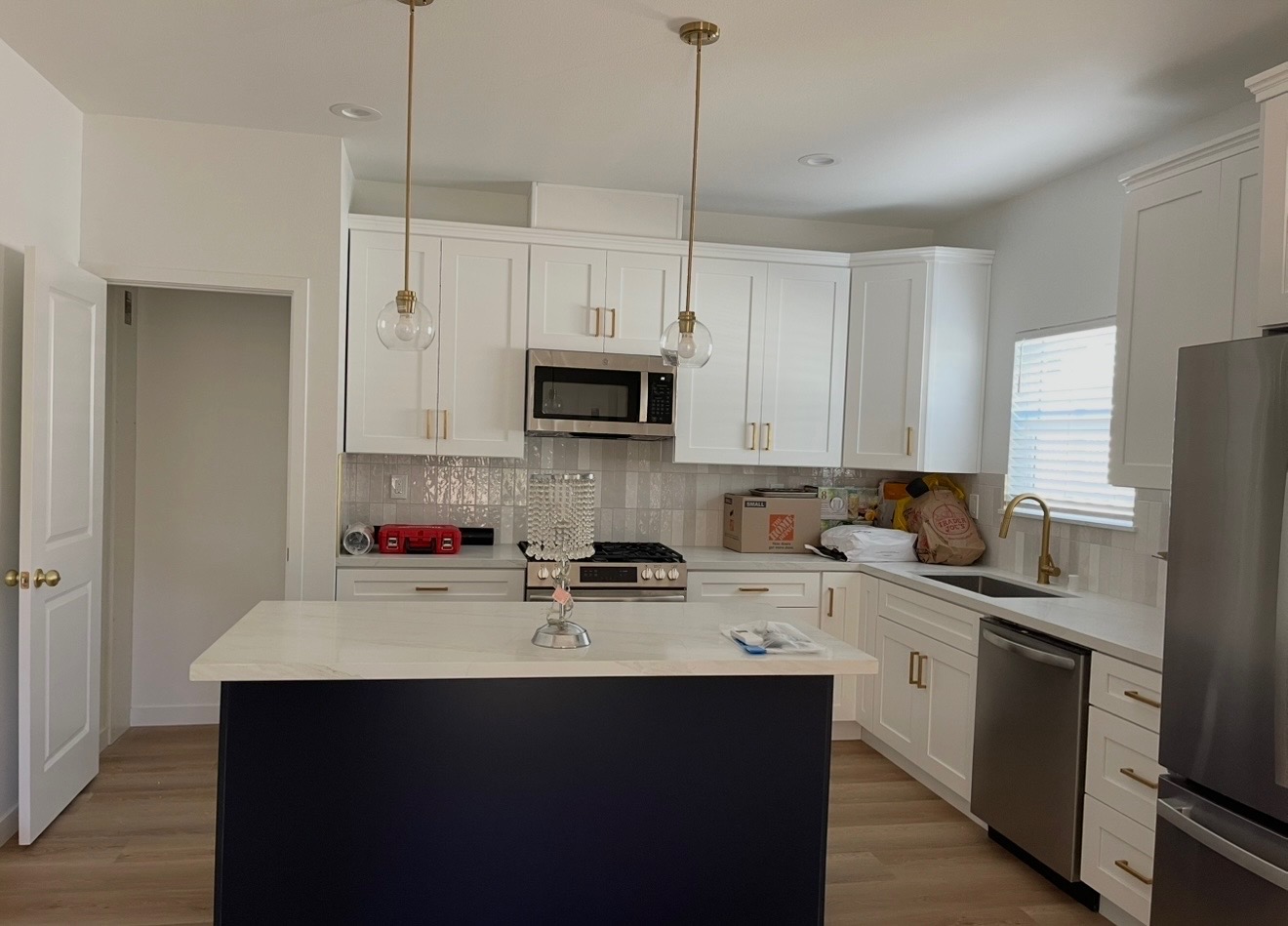 Kitchen with white cabinetry from the Campos Contractors project gallery